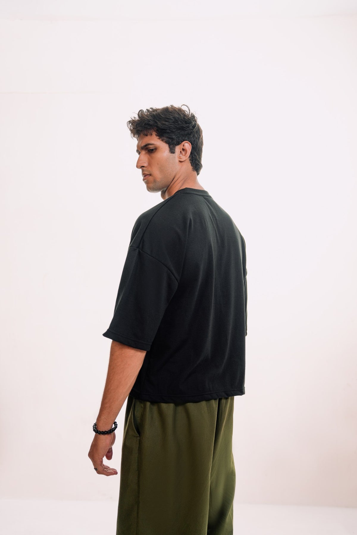 model:male model:studio | Zamana Alumni Tee — back, studio