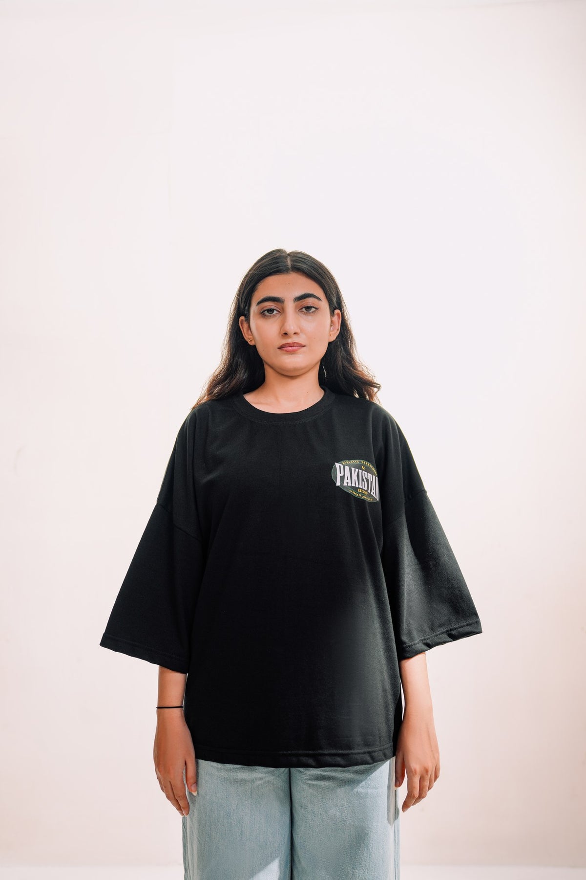 model:female model:studio | Zamana Alumni Tee — front, worn by female model, studio