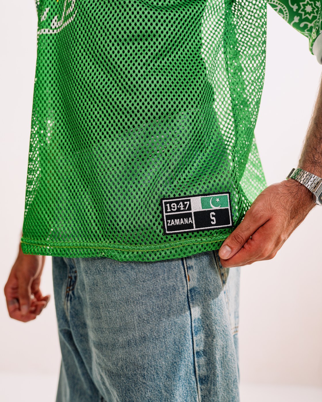 Pakola Green jersey — sleeve with 1947 ZAMANA size label, studio