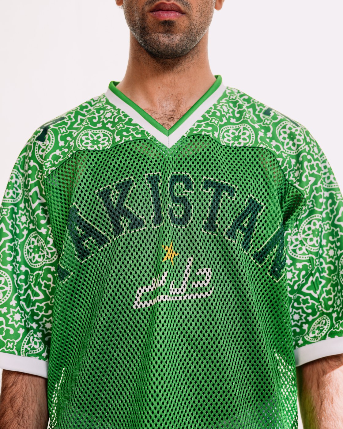 Pakola Green jersey — PAKISTAN chest graphic and mesh, studio